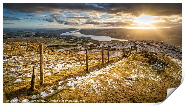 Wansfell Pike sunset with Windermere in the background Print by Julian Carnell