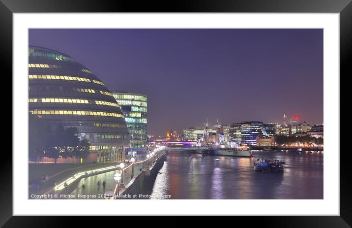 View of the London skyline at night with river thamse and lots of light Framed Mounted Print by Michael Piepgras