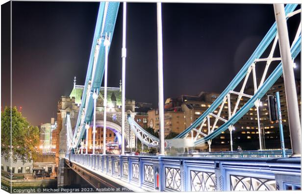 The Tower Bridge in London at night with colorful lights Canvas Print by Michael Piepgras