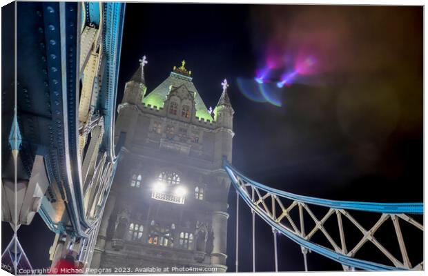 The Tower Bridge in London at night with colorful lights Canvas Print by Michael Piepgras