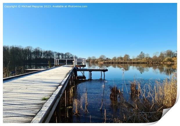 Beautiful landscape on a jetty by a lake with blue sky. Print by Michael Piepgras