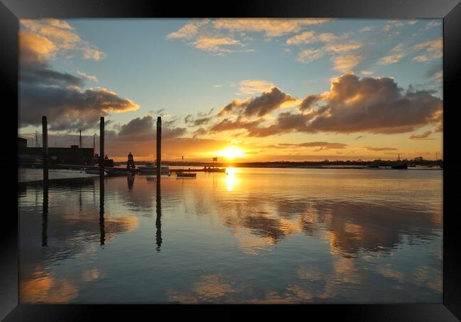 Sunrise reflections over Brightlingsea Harbour  Framed Print by Tony lopez