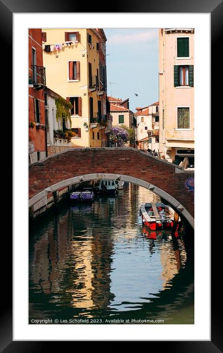 Bridge over canal Venice  Framed Mounted Print by Les Schofield