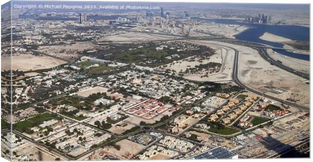 Aerial view over the city center of dubai on a sunny day Canvas Print by Michael Piepgras