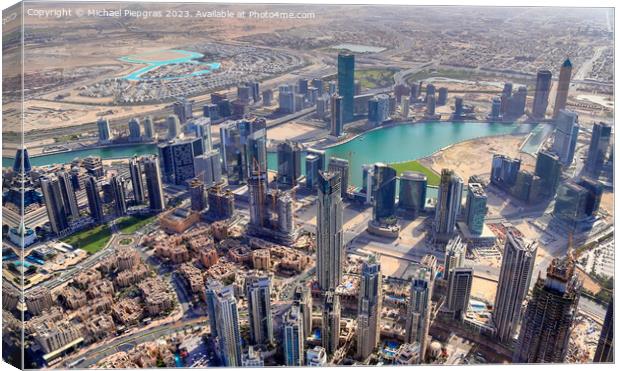 Aerial view over the city center of dubai on a sunny day Canvas Print by Michael Piepgras