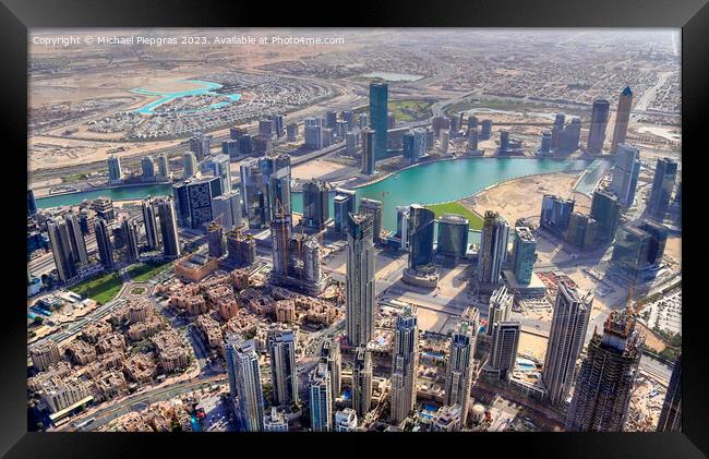 Aerial view over the city center of dubai on a sunny day Framed Print by Michael Piepgras