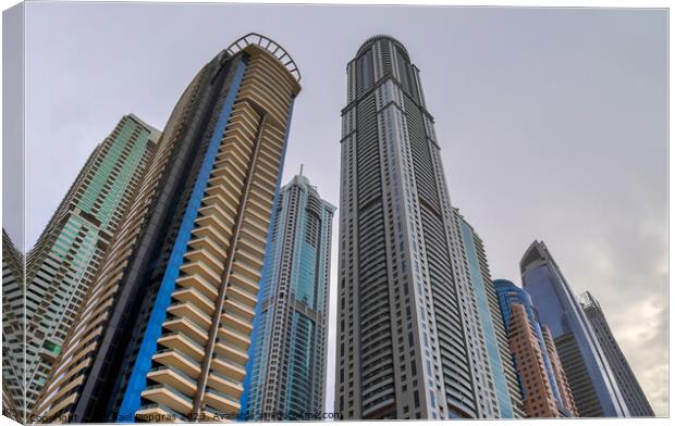Luxury modern skyscrapers in the center of Dubai city. United Ar Canvas Print by Michael Piepgras