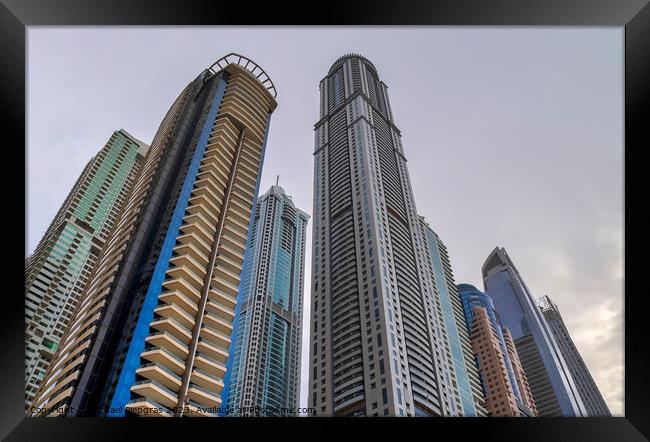 Luxury modern skyscrapers in the center of Dubai city. United Ar Framed Print by Michael Piepgras