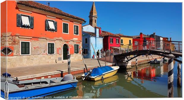 The Vibrant Rustic Charm of Burano Island Canvas Print by Les Schofield