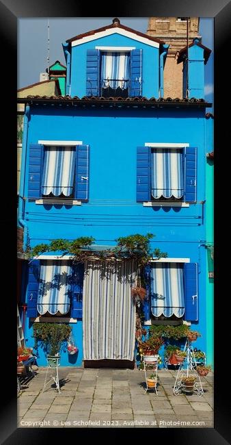 Enchanting Blue House in Burano Framed Print by Les Schofield