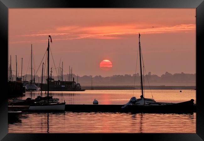 Red sunrise over Brightlingsea Harbour  Framed Print by Tony lopez