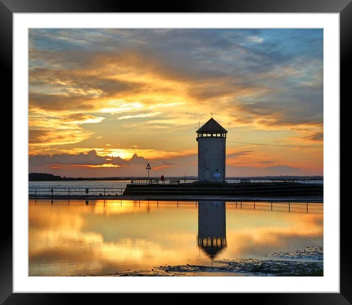  Sun set reflections over the Brightlingsea tidal pool  Framed Mounted Print by Tony lopez