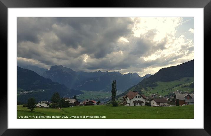 Sunlit Sky over the Swiss Alps Framed Mounted Print by Elaine Anne Baxter
