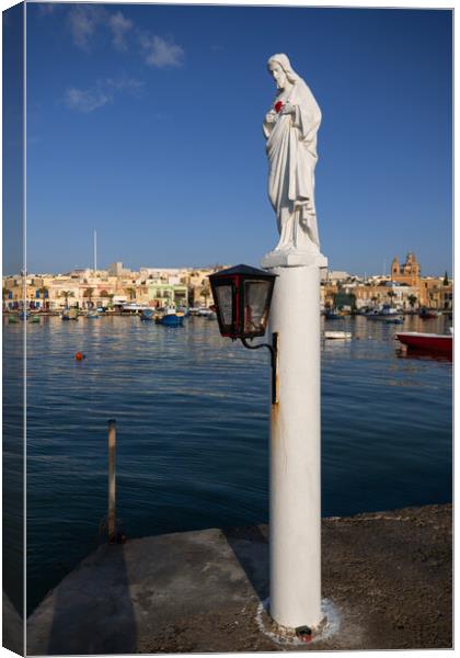 Statue of Jesus at Sea Harbor in Malta Canvas Print by Artur Bogacki