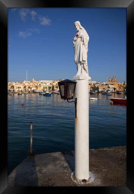 Statue of Jesus at Sea Harbor in Malta Framed Print by Artur Bogacki