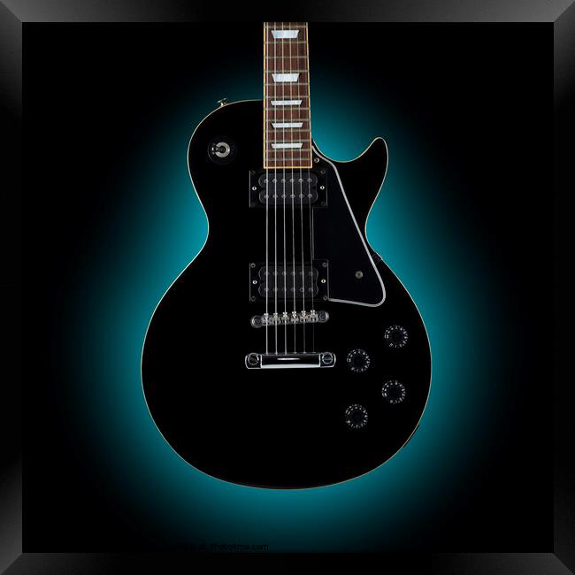 Eclipse of the Black Guitar Framed Print by Phill Thornton