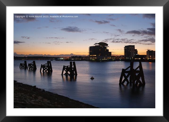 Cardiff bay sunset winter Framed Mounted Print by Kevin Round