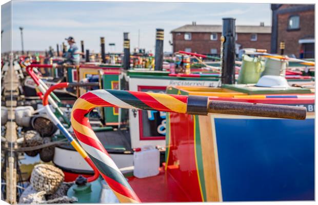 Colourful steering tillers on narrow boats Canvas Print by Jason Wells