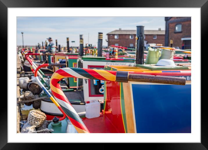 Colourful steering tillers on narrow boats Framed Mounted Print by Jason Wells