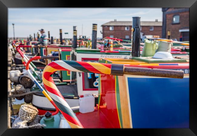 Colourful steering tillers on narrow boats Framed Print by Jason Wells