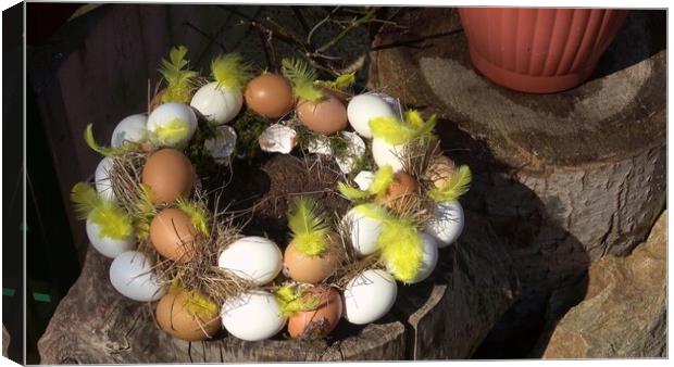 Easter composition made from colored chicken eggs. Easter eggshell wreath. Canvas Print by Irena Chlubna