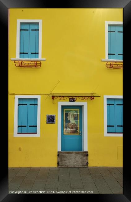 Burano yellow house  Framed Print by Les Schofield