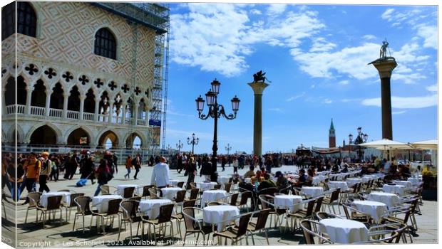 Saint mark square Venice  Canvas Print by Les Schofield