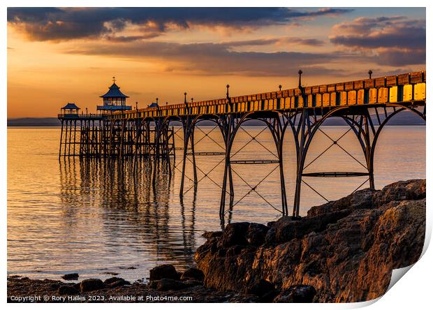 Clevedon Pier at Sunset with the pier side panels catching the sunlight Print by Rory Hailes