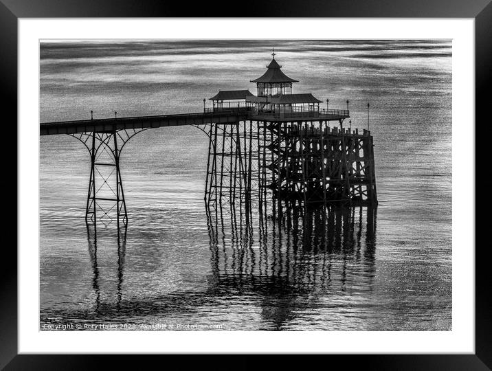 Clevedon Pier at sunset on a calm and tranquil evening Framed Mounted Print by Rory Hailes