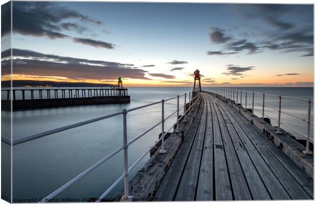 Sunset at Whitby east pier Canvas Print by Martin Williams