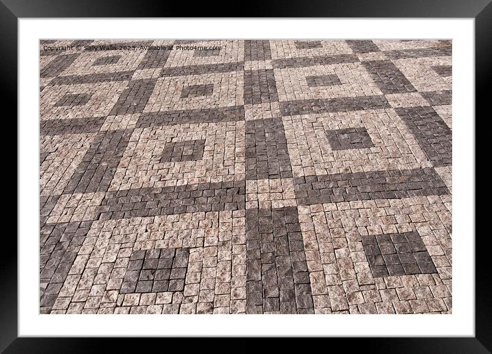 Cobbled pavement in symmetrical patterns Framed Mounted Print by Sally Wallis