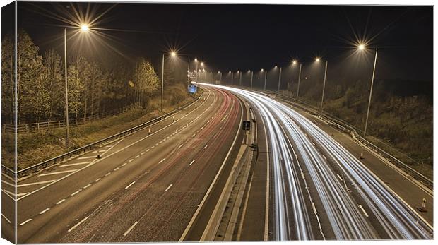 Motorway M62 at Night Canvas Print by Kev Rayner