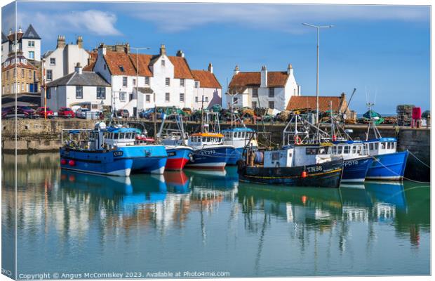 Fishing boats in Pittenweem harbour Canvas Print by Angus McComiskey