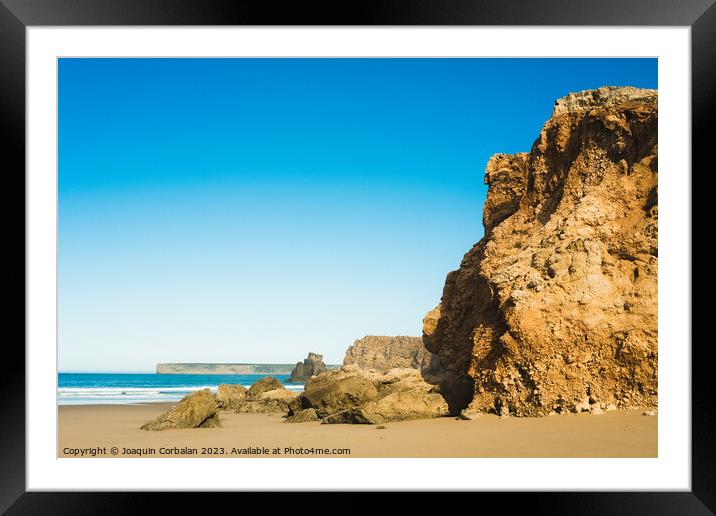 tranquil and serene ambiance of the Algarve's coastline is perfe Framed Mounted Print by Joaquin Corbalan