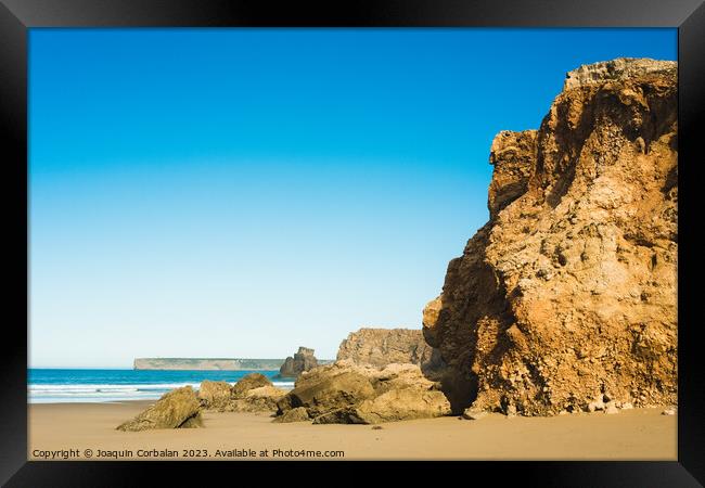 tranquil and serene ambiance of the Algarve's coastline is perfe Framed Print by Joaquin Corbalan