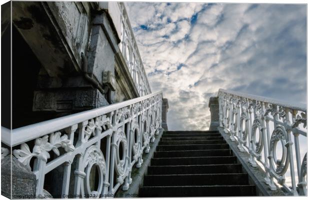 Ancient decorated staircase with beautiful handrails goes up tow Canvas Print by Joaquin Corbalan