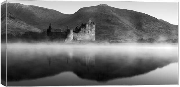 Misty Reflections of Kilchurn Castle Canvas Print by Anthony McGeever