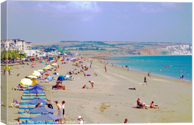 Sandown beach in August on the Isle of Wight. Canvas Print by john hill
