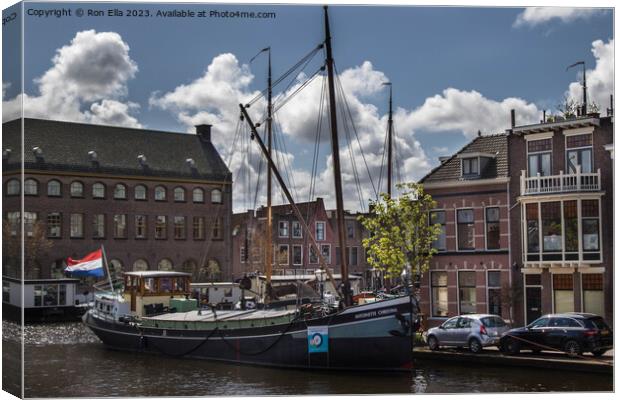 Navigating Leiden's Historic Harbor Canvas Print by Ron Ella