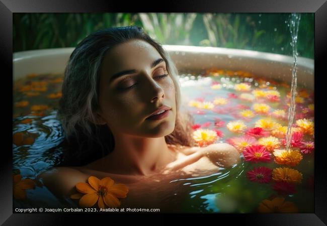 A beautiful young woman enjoys a relaxing floral bath to de-stre Framed Print by Joaquin Corbalan