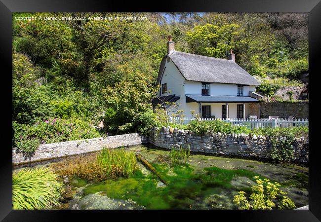 Fairytale Cottage in a Picturesque Village Framed Print by Derek Daniel