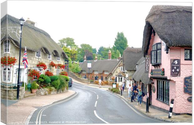 Enchanting Charm of Shanklin's Thatched Village Canvas Print by john hill