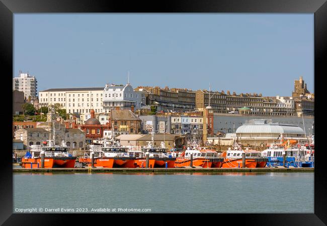 Orange Boats Framed Print by Darrell Evans