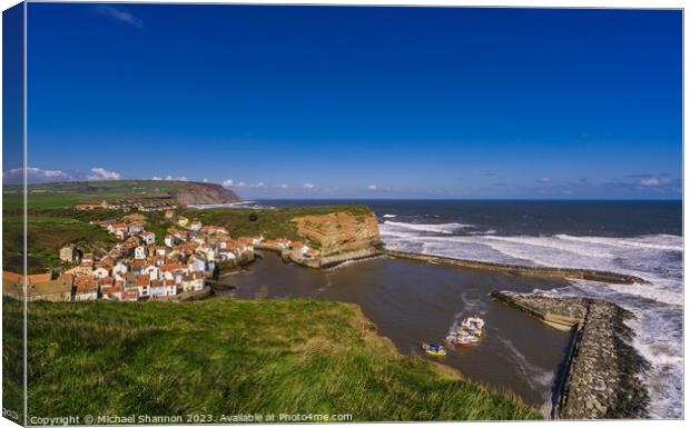 Clifftop view of Staithes from the Cleveland Way Canvas Print by Michael Shannon