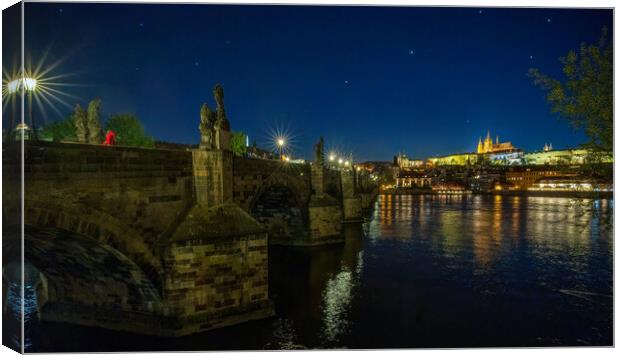 Panoramic cityscape view of Charles Bridge over Vltava river locate in Prague in Czech Republic during night sky Canvas Print by Arpan Bhatia