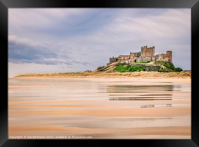 Across the sand to Bamburgh Castle Framed Print by Darrell Evans