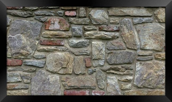 Masonry wall of multicolored stones or blocks Framed Print by Irena Chlubna