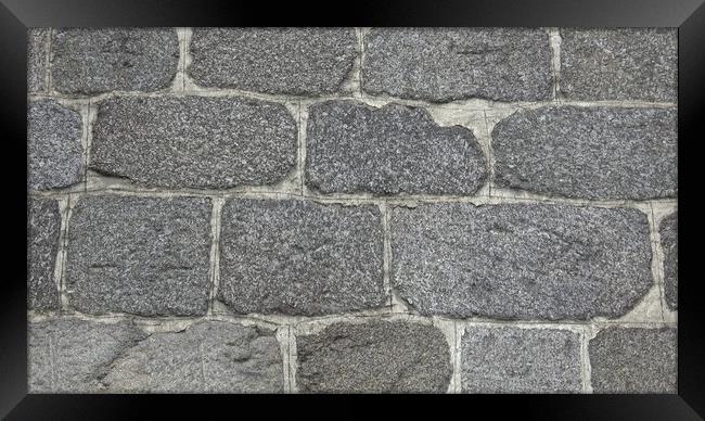 Detail of a stone wall with different size of rocks. Framed Print by Irena Chlubna