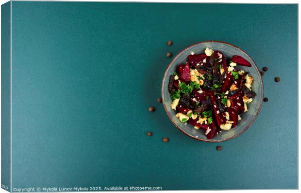 Beetroot salad with wallnuts and cheese,space for text. Canvas Print by Mykola Lunov Mykola