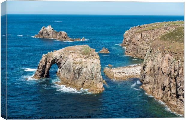Enys Dodnan Arch, Lands End, Cornwall Canvas Print by Keith Douglas